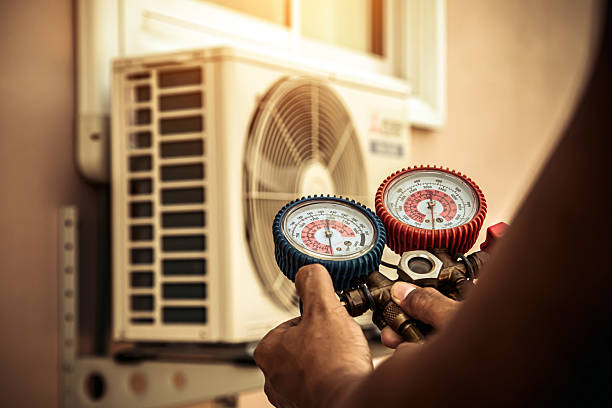 Professional Air Conditioning Service technician working in Woody Creek, CO